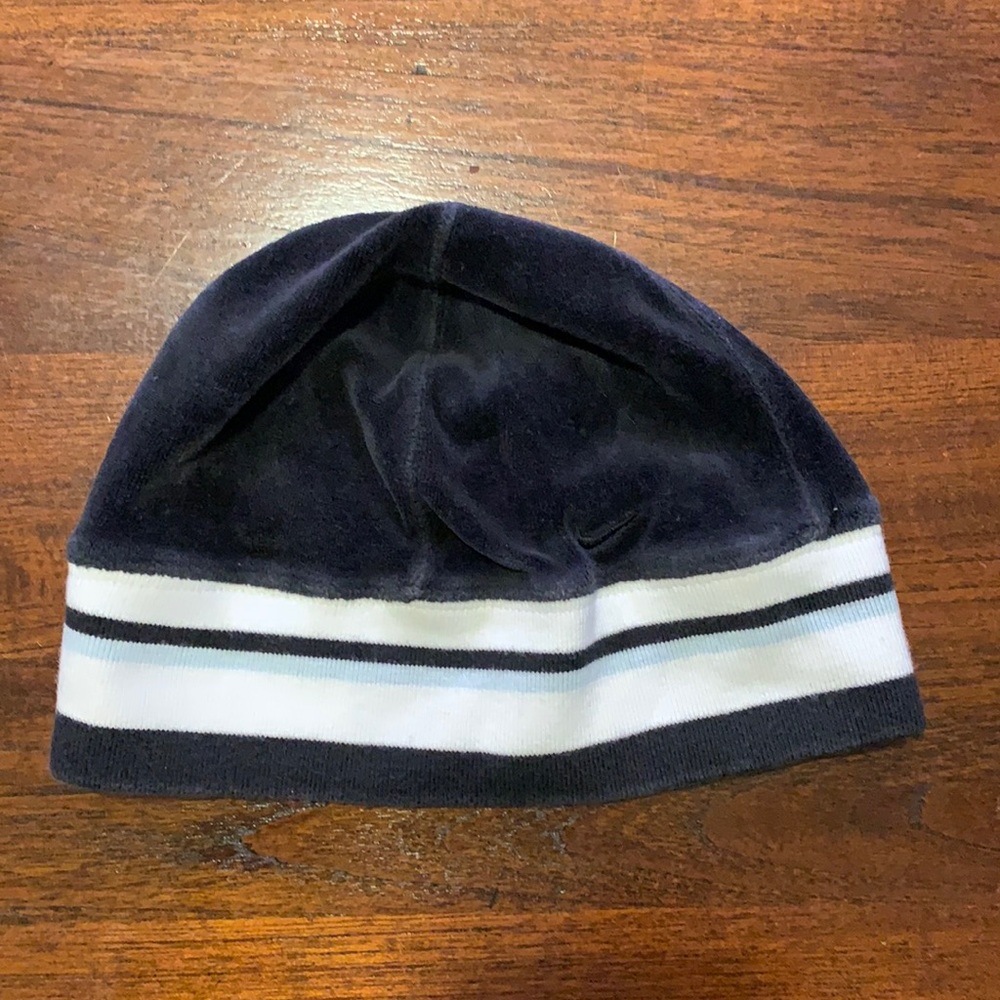 Nike brand winter beanie hat. Black with light blue and white. Unisex.